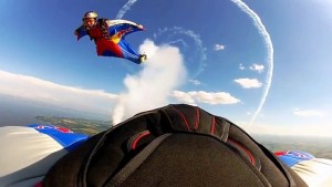 Red Bull Wingsuit Pilots Circled by Stunt Plane